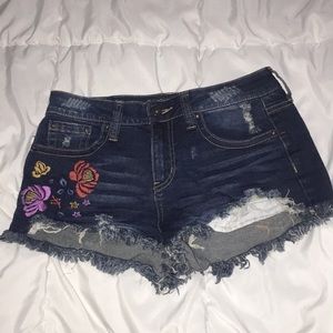 Jean shorts with flower design